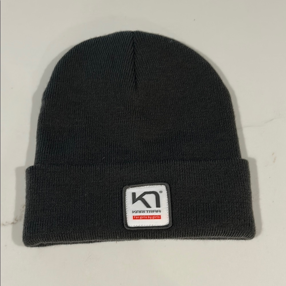 Women’s Kari Tara dark gray knit beanie with logo -brand new, never worn NWOT